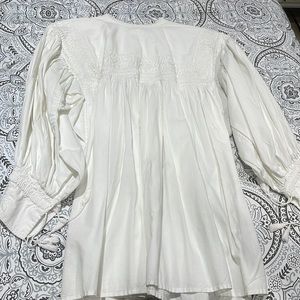 Beautiful have made white cotton blouse with hand embroidered details
